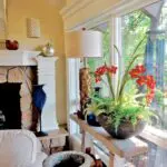 an eclectic art filled living room bathed in natu 2022 11 04 23 25 15 utc