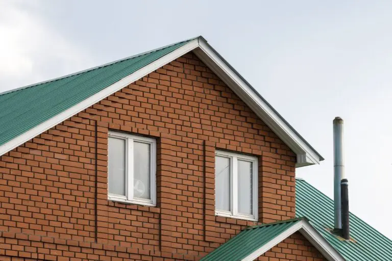 red brick house with green roof traditional europ 2022 10 24 23 40 13 utc